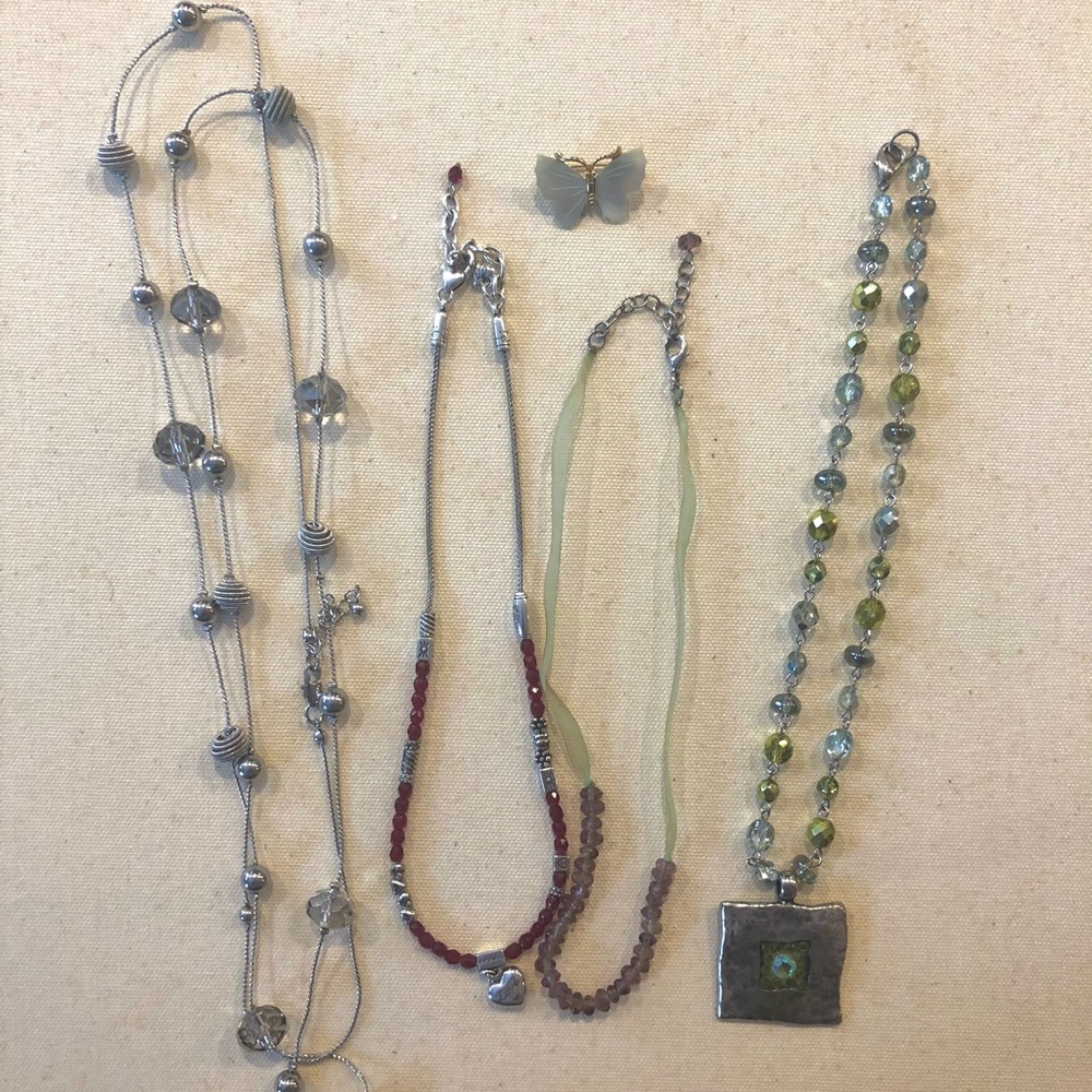 Lot of 4 costume necklaces and a butterfly pin